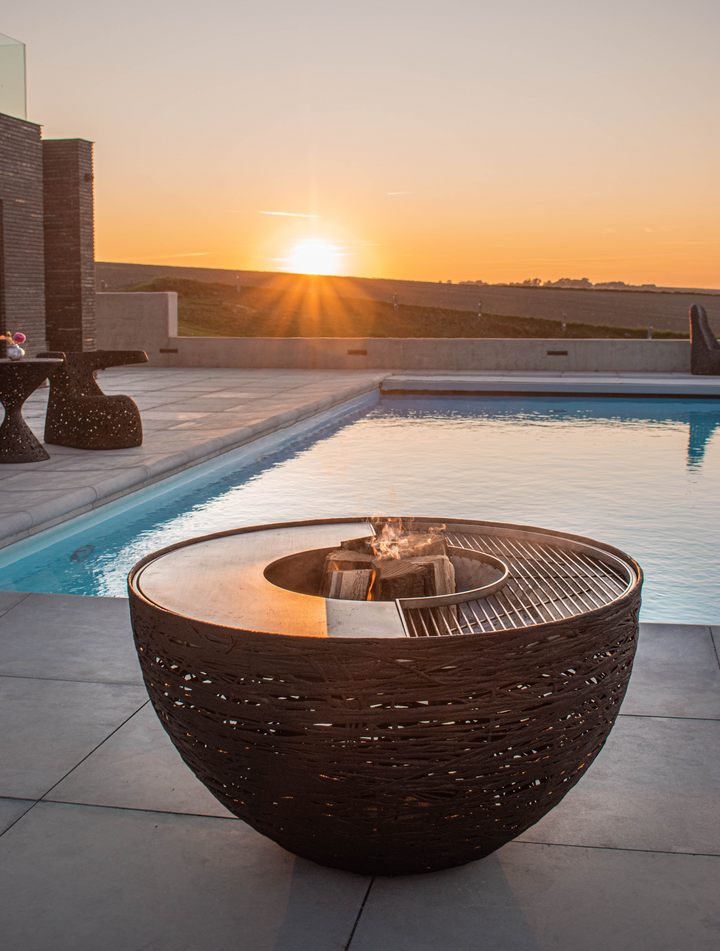 resort-style backyard
luxury outdoor furniture
high-end patio design
outdoor living inspiration